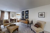 Located at 3602 Maldon Way in High Point, NC, this single-floor, two-bedroom, two-bathroom home offers a well-organized and comfortable layout. The living room is generously sized with soft carpet flooring, neutral walls, and natural light filtering through windows — creating a warm and inviting atmosphere. A dedicated dining area adjacent to the kitchen features tile flooring and ample wall space, ideal for everyday meals. The kitchen is fully equipped with white cabinetry, a full suite of white appliances including a refrigerator, electric range, microwave, and dishwasher, complemented by a double-basin sink and tile flooring throughout. The primary bedroom is a comfortable retreat, featuring carpeted floors, natural light from windows with sheer curtains, and access to a dedicated closet. The second bedroom also offers carpet flooring, a ceiling fan, natural light, and closet access. Both bathrooms are practical and clean, with tile flooring, vanities, and tub-shower combinations. A hallway connects the bedrooms and bathrooms, providing a logical flow throughout the home. Two closets offer practical storage solutions. Overall, the space presents a functional and well-maintained single-floor layout suited for everyday living.