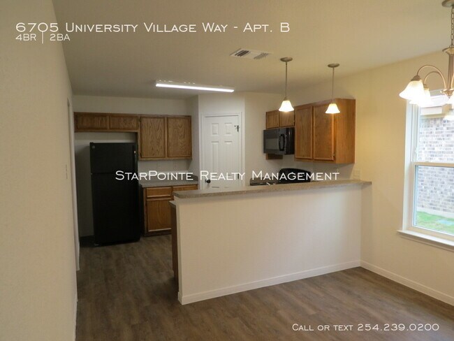 Foto del edificio - 6705 University Village Way Apt. B