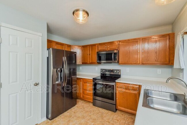 Building Photo - 6170 Iverson Ct