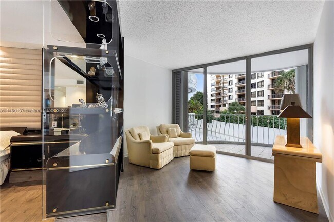Building Photo - 10155 Collins Ave
