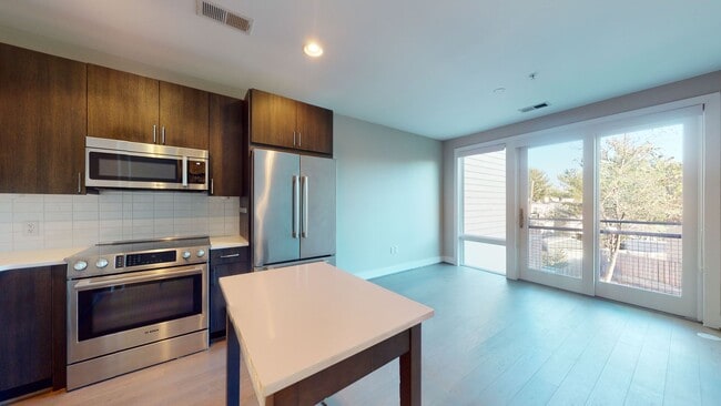 Building Photo - Capitol Hill-Modern & Sleek One Bedroom Plus Large Office Space, Parking Included, Pets Welcomed,...
