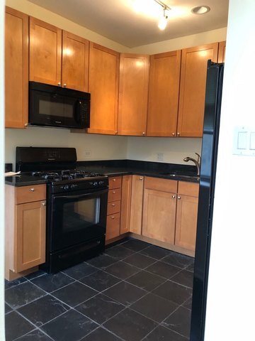 Foto del edificio - 7432 N Oakley Ave