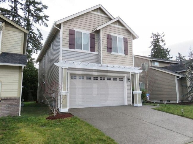 Building Photo - Beautiful Home located in a gated communit...