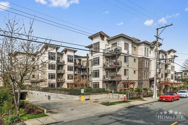 Building Photo - Exceptional Condo Living in the Heart of Maple Ridge — 1 Bed Plus Den / 1 Bath Corner Unit at Wel...