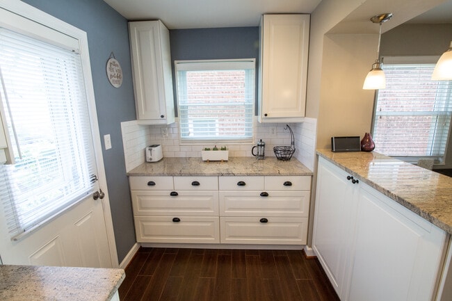 Kitchen- abundant pantry and storage space. - 5067 10th St NE