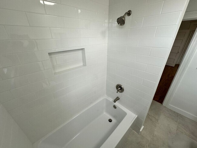 Building Photo - Stylish and Renovated 1BR, 1BA Condo Nestl...