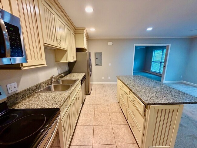 Building Photo - Top-Floor South End Villa Near Coligny Beach- Available Now!