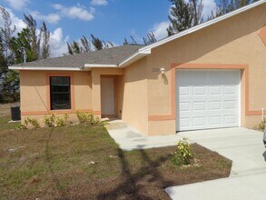 Building Photo - 1207-1209 Gleason Pkwy