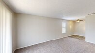 This 530 square foot single-story residence, located at 709 W Houston St in Broken Arrow, OK, offers a well-designed living space. The home features a primary bedroom measuring 130 square feet, a spacious living room, and a dedicated closet area. Throughout the property, neutral-toned walls create a blank canvas for personalization, while plush carpeting adds comfort underfoot. Windows in each room, including a sliding glass door in the living area, allow for abundant natural light, enhancing the sense of space. The living room appears to be the focal point of the home, offering direct access to an outdoor area. The bedroom, while compact, includes a window and access to the closet space. Textured ceilings throughout add a subtle design element. The property's layout maximizes the use of its 530 square feet, creating a cozy yet functional living environment suitable for a single occupant or couple.