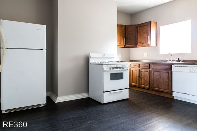 Building Photo - 3 br, 2 bath House - 1031 E Warrington Ave...