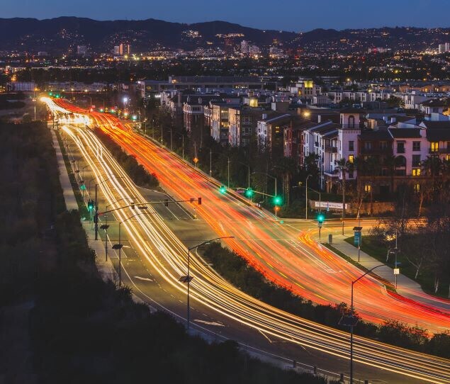 Speeding highway traffic in the city