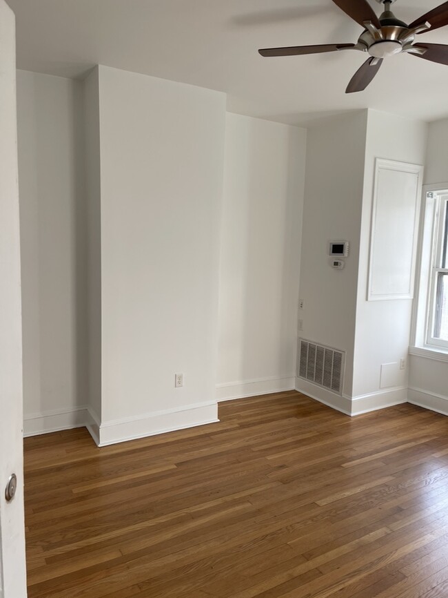 Living Room from front door - 105 W 3rd St