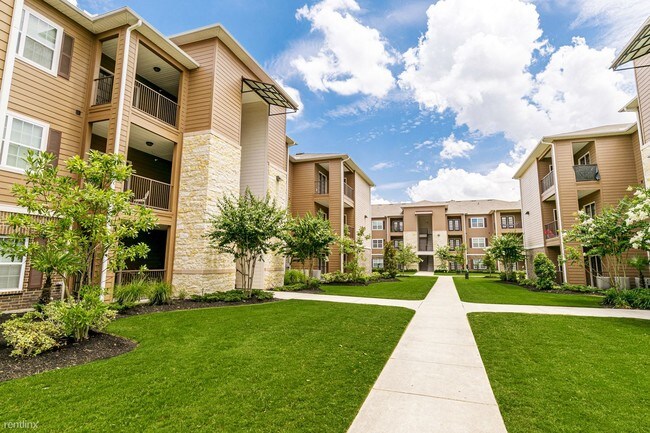 Foto del edificio - 3223 Spring Cypress Rd