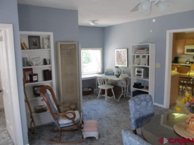 Office nook in living room 1. - 165 NW 2nd St