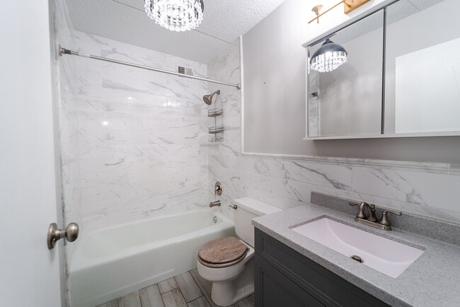 Bathroom with tile all around - 2015 S Finley Rd