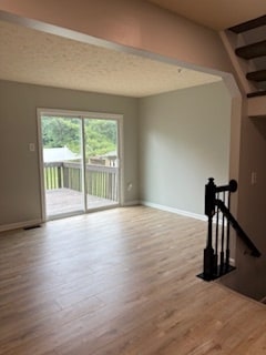 Continuous Hybrid Flooring Throughout Each Level - 8026 Brightlight Pl