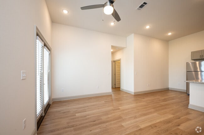 The Iris: 3BR, 2BA- Living Room - The Waters at Settlers Trace