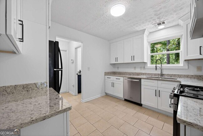 Foto del edificio - 6898 Babbling Brook Dr