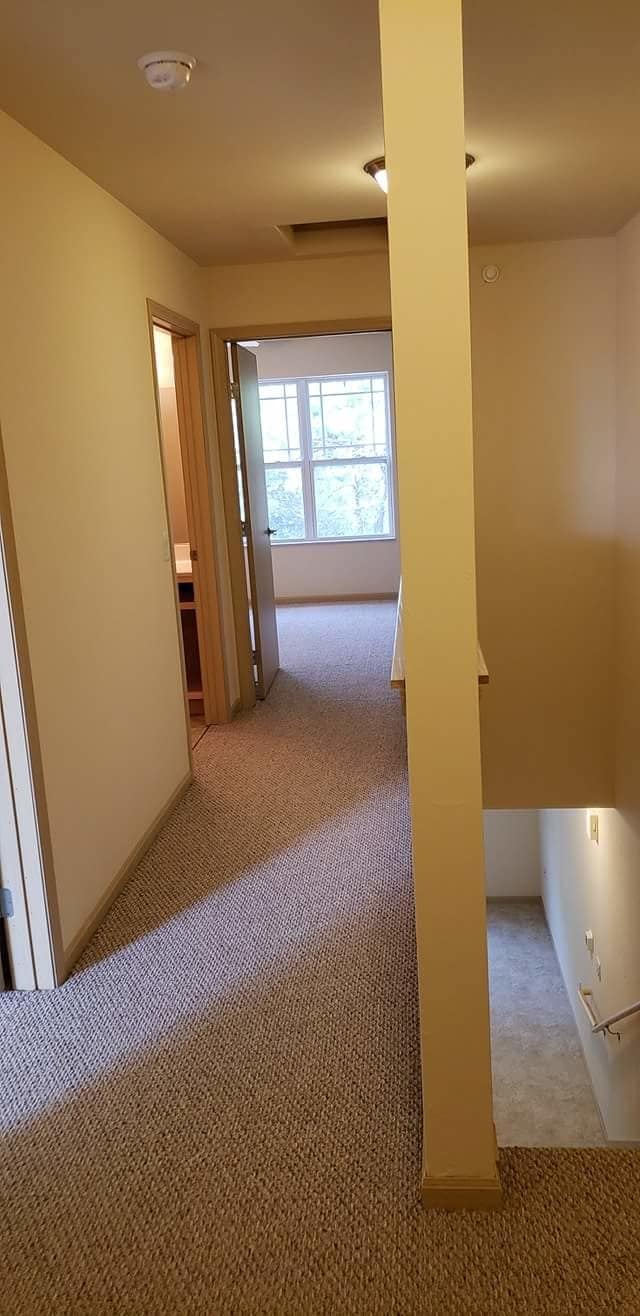 Building Photo - Whispering Echoes Townhomes