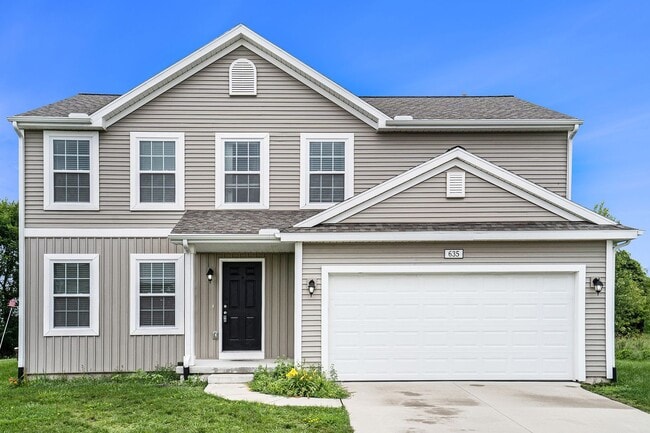 Building Photo - Comfortable and stylish home in the heart ...