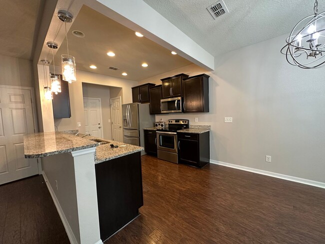 Building Photo - Lovely Bartram Townhome with 2 Car Garage.