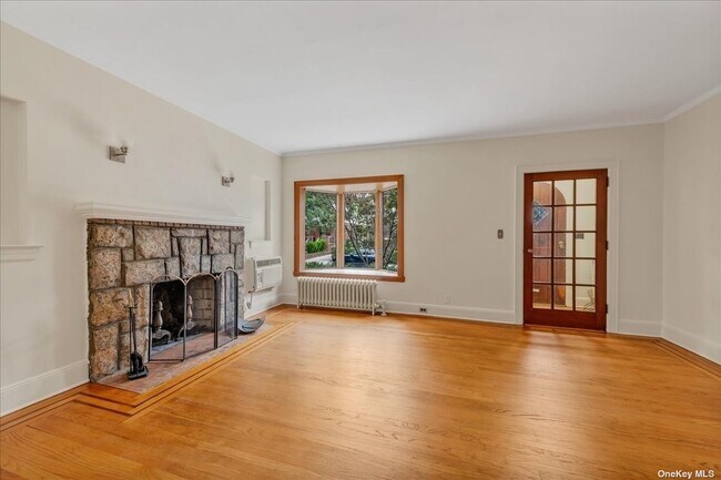 Building Photo - 64-30 Fitchett St