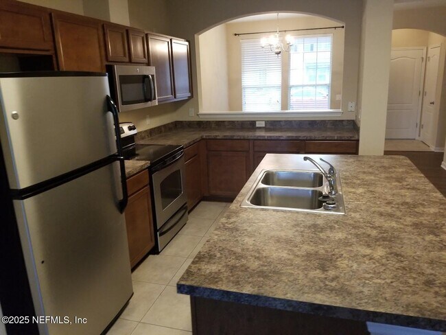 Foto del edificio - 4220 Plantation Oaks Blvd