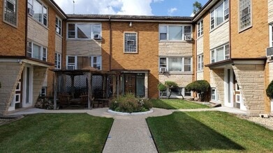Building Photo - 7400-7410 W Diversey Ave