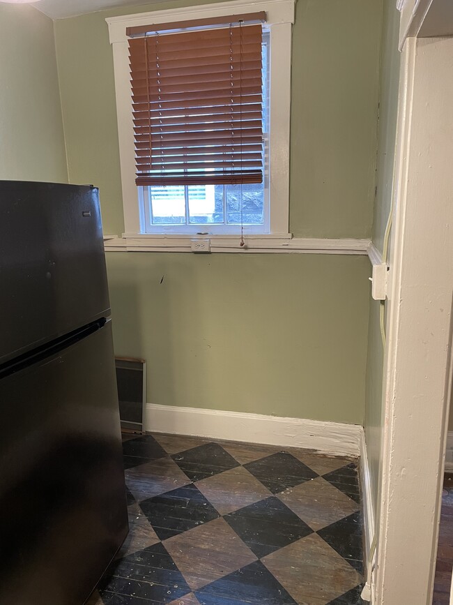 Kitchen angle 2 - 210 E State St