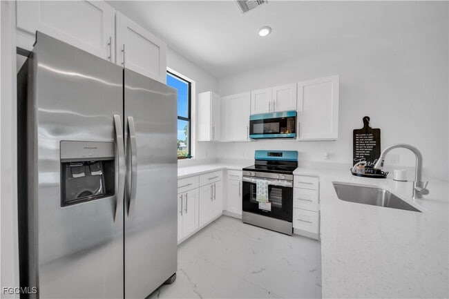 Foto del edificio - 936-938 Homestead Rd S