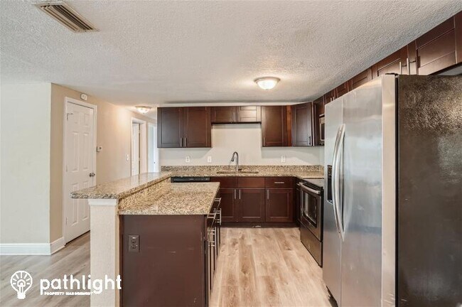 Building Photo - 10289 128th Terrace N