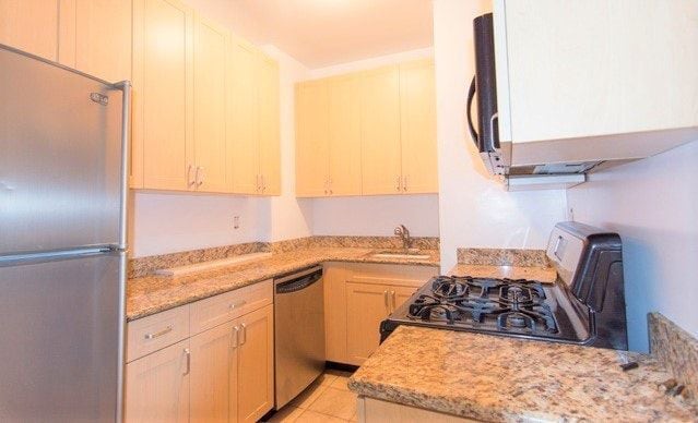 Photo - 201-205 W 11th St Apartment