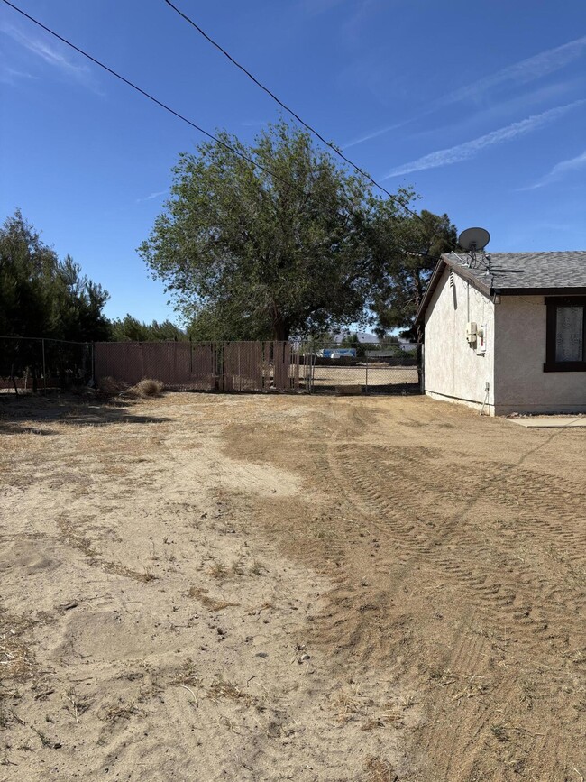 Building Photo - 10136 E Ave Q-10