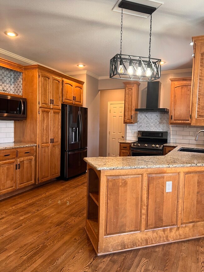 Kitchen with newer appliances - 14090 S Greenwood St