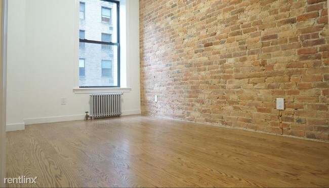 Building Photo - 114 E 57th St
