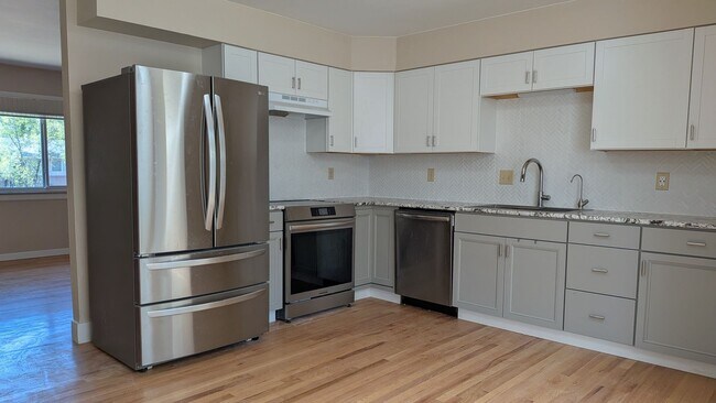 Building Photo - Spacious 4-Bedroom Ranch on Large Lot with Finished Basement