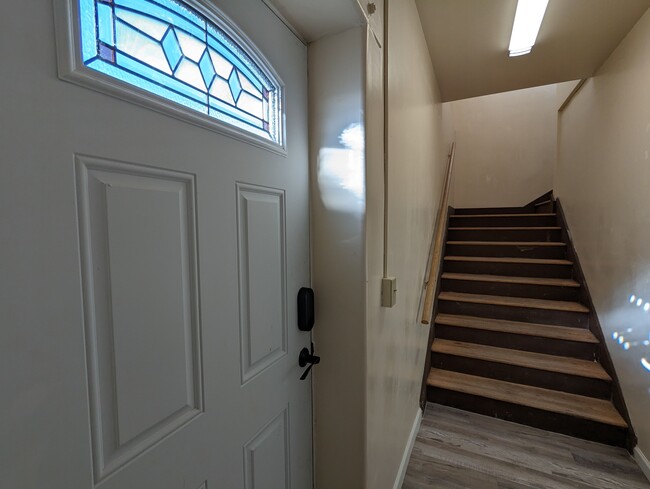 Hallway up the stairs to the unit - 613 4th St