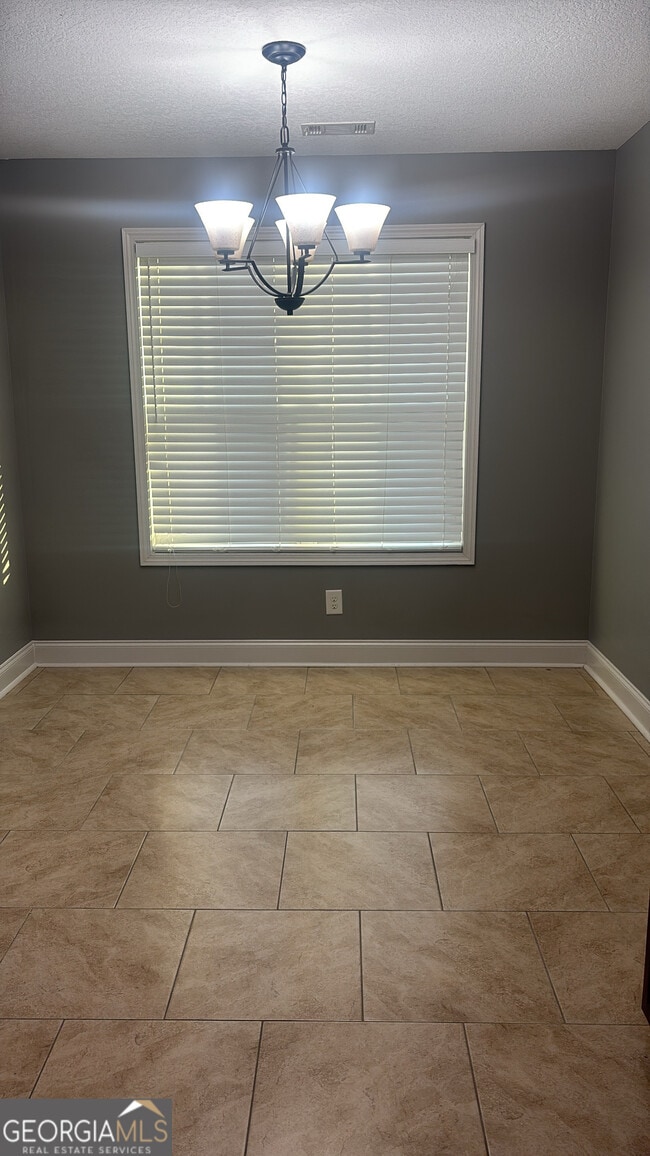 Building Photo - 303 S Charity Ln