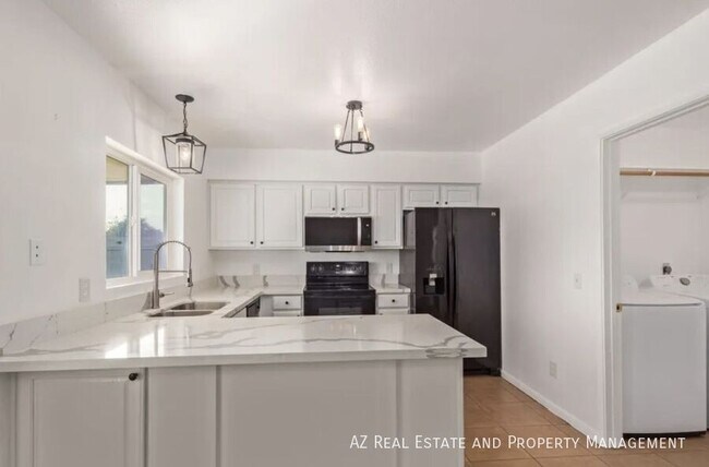 Foto del edificio - 6421 W Carol Ave