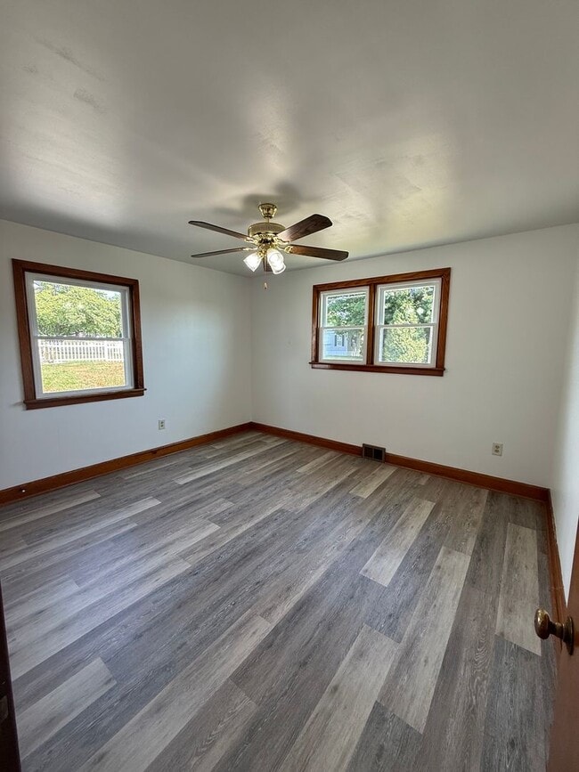 Building Photo - Charming 4-Bedroom Cape Cod Home with Spacious Yard & Storage