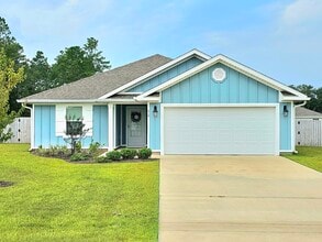 Building Photo - 410 Sweet Blossom Bend