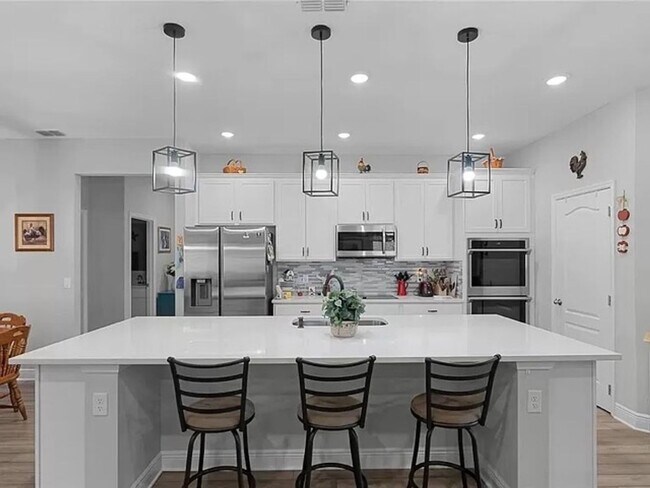 Building Photo - Executive home located in the Glen in Frui...