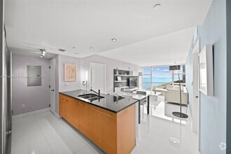 Building Photo - 6801 Collins Ave