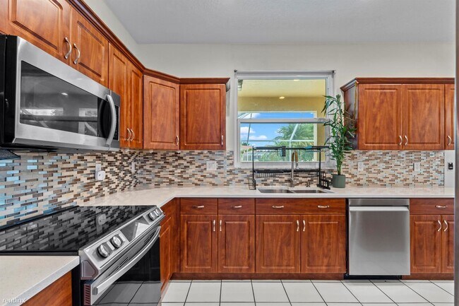 Foto del edificio - 5 br, 3.5 bath House - 12918 Clifton Dr