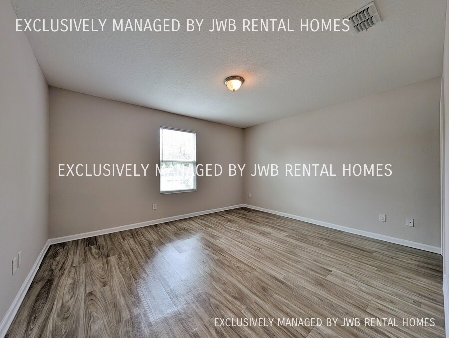 Building Photo - 8509 McGirts Village Ln