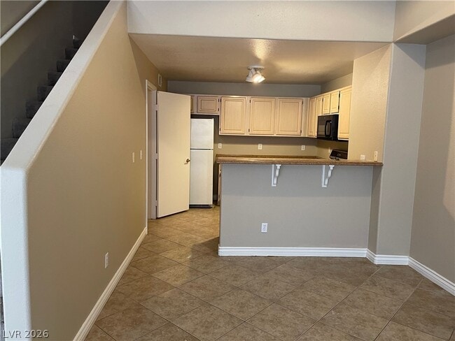 Building Photo - 5125 W Reno Ave