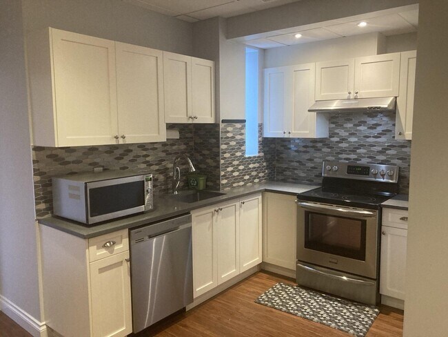 Photo du bâtiment - 13520-1355A 55 A Ave