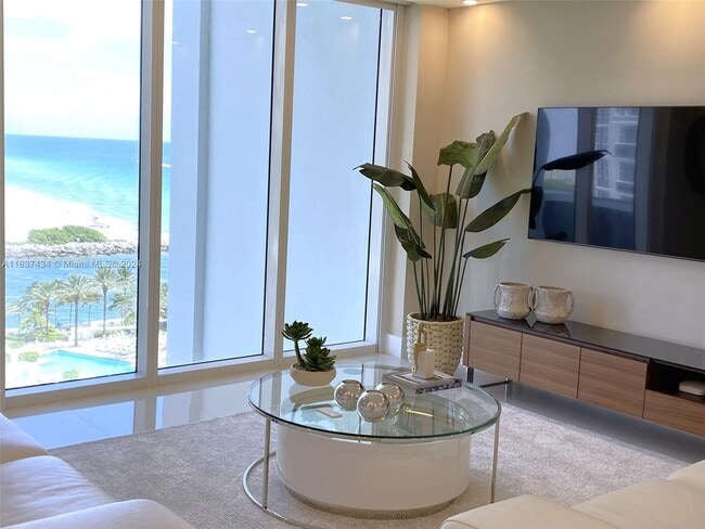 Building Photo - 10275 Collins Ave