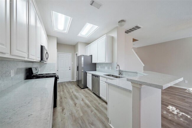 Foto del edificio - 12430 Cane River Ln