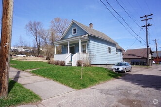 Building Photo - 218 N 8th Ave E